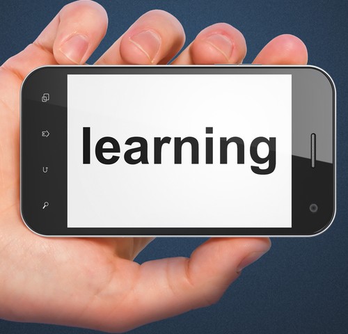 The word "Learning" on a mobile phone