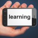 The word "Learning" on a mobile phone