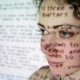 Woman with slide text projected on her face